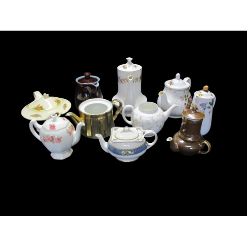 242 - A collection of Decorative China Tea and Coffee pots including Denby, Madock and Royal Doulton