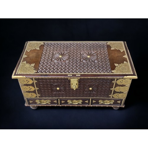 7 - A LARGE BRASS MOUNTED ZANZIBAR CHEST.