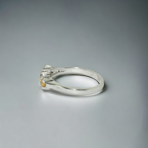 150 - A 9ct white  gold and Citrine bar ring.
size N