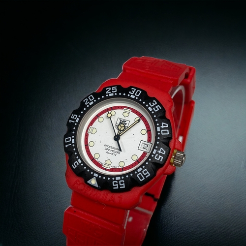 78 - AN ORIGINAL TAG HEUER McCLAREN FORMULA 1 MEN'S WRISTWATCH. RED / BLACK DIAL. 1980’s

'FROM A COLLECT... 