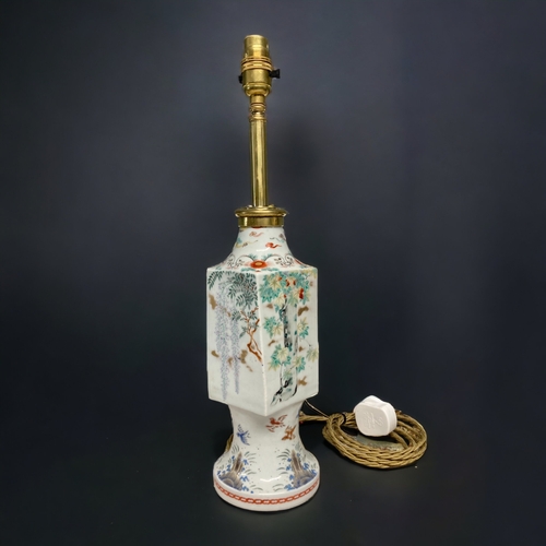 214 - AN UNUSUAL JAPANESE KAKIEMON PORCELAIN VASE, CONVERTED TO A LAMP. A 'TWISTED' SQUARE BOY WITH A LONG... 