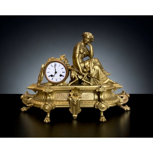 201 - A 19th century French Japy freres Gilt bronze mantle clock. Mounted with a seated musician with nume... 