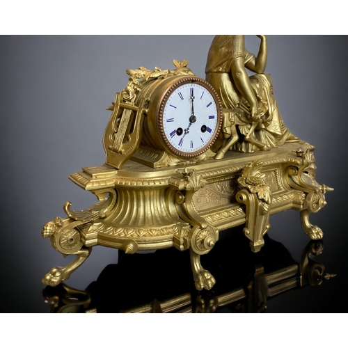 201 - A 19th century French Japy freres Gilt bronze mantle clock. Mounted with a seated musician with nume... 