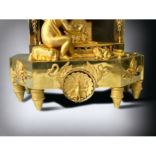 207 - A FRENCH EMPIRE ORMOLU MANTLE CLOCK.
CIRCA 1810.
WHITE ENAMEL DIAL, WITH BLACK ROMAN NUMERALS, SIGNE... 