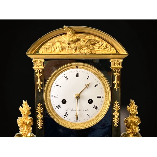 207 - A FRENCH EMPIRE ORMOLU MANTLE CLOCK.
CIRCA 1810.
WHITE ENAMEL DIAL, WITH BLACK ROMAN NUMERALS, SIGNE... 