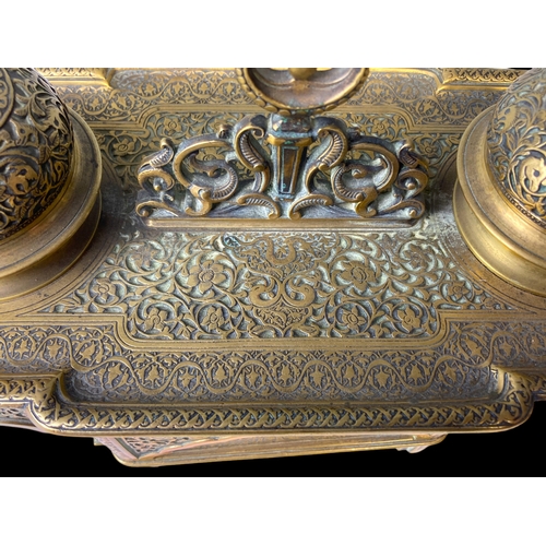 205 - A GILT BRONZE DESK STAND INKWELL.  
19TH CENTURY.
INTRICATELY DETAILED 'PERSIAN' TYPE DESIGN, DEPICT... 