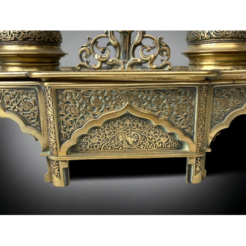 205 - A GILT BRONZE DESK STAND INKWELL.  
19TH CENTURY.
INTRICATELY DETAILED 'PERSIAN' TYPE DESIGN, DEPICT... 