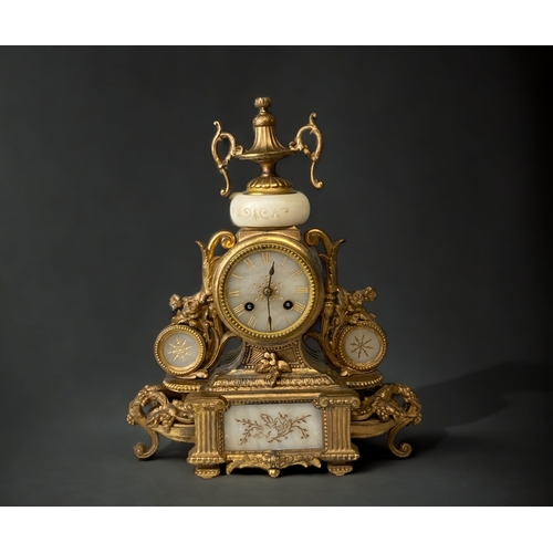 209 - A FRENCH GILT METAL AND ALABASTER MANTLE CLOCK.
CARVED & GILDED ALABASTER FACE WITH ROMAN NUMERALS.
... 