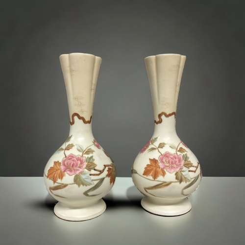 222 - A PAIR OF HANDPAINTED BLUSH PORCELAIN VASES. 
25CM TALL