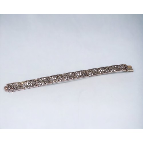 203 - A ladies 925 silver filigree Marcasite bracelet.