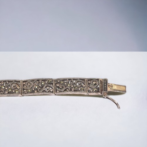 203 - A ladies 925 silver filigree Marcasite bracelet.