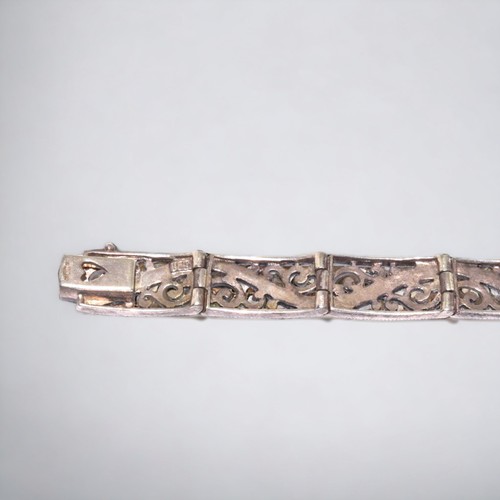 203 - A ladies 925 silver filigree Marcasite bracelet.