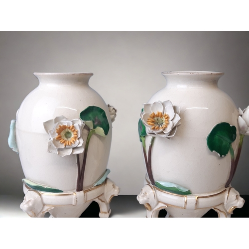 238 - A PAIR OF CHRISTOPHER DRESSER FOR MINTON 'CHINESE TRIPOD' VASES. 
RELIEF LILY DESIGN.
DATE CYPHERS F... 