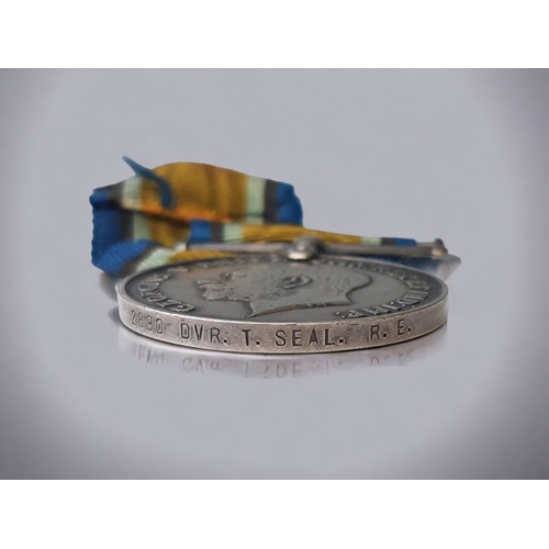 169 - TWO WWI GEORGE V BRITISH WAR MEDALS. WITH RIBBONS. 
ONE NAMED 'DVR. T. SEAL. R.E.'
THE OTHER NAMED '... 