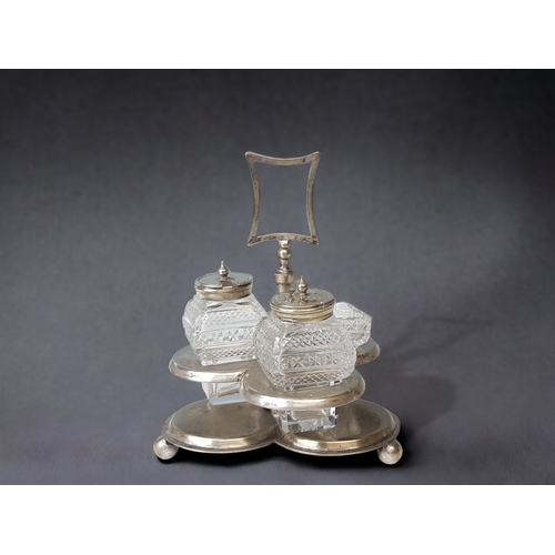 251 - A VICTORIAIN DRESSER STYLE SILVER PLATE ROTATING CRUET SET.