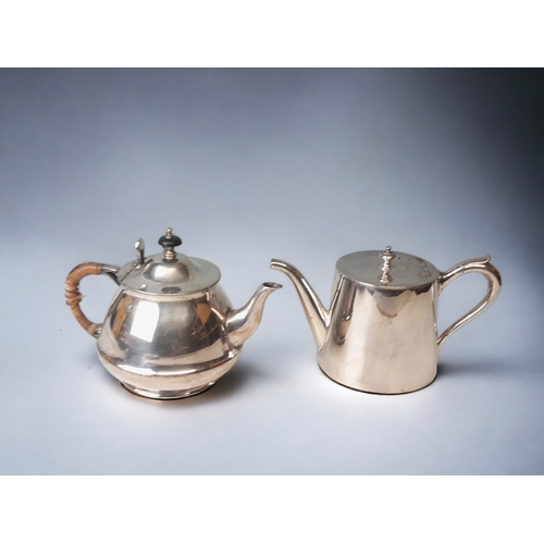 256 - TWO 19TH CENTURY SILVER PLATE TEAPOTS AND HOT WATER JUG.