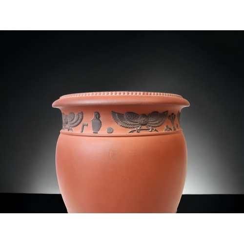 279 - A WEDGWOOD ROSSO ANTICO EGYPTIAN REVIVAL VASE. 
HEIGHT - 14.5CM