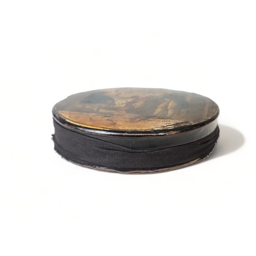 210 - AN EARLY 19TH CENTURY PAPIER MACHE SNUFF BOX. DECORATED WITH 'ROBERT BURNS' POEM SCENE.
DIAMETER - 8... 