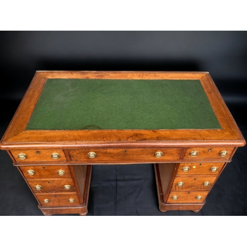 87 - A VICTORIAN LADIES PEDESTAL LEATHER TOPPED WRITING DESK.