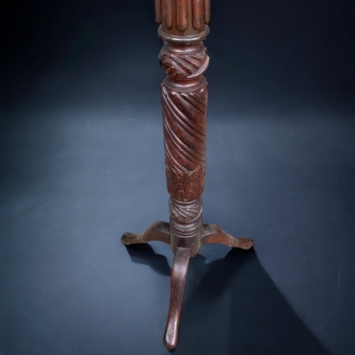 92 - A VICTORIAN TRIPOD CARVED TORCHERE STAND.