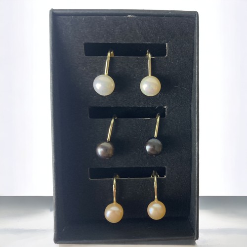 117 - 3 pairs of cultured pearl clip earrings and necklace.