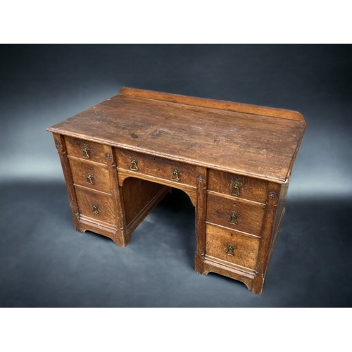 102 - AN EARLY VICTORIAN GILLOWS OF LANCASTER & LONDON OAK WRITING TWIN-PEDESTAL DESK.