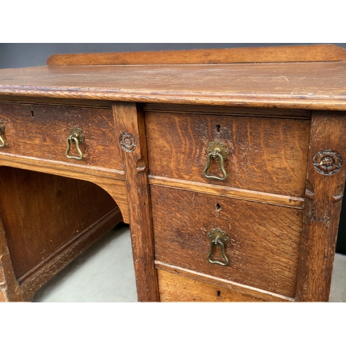 102 - AN EARLY VICTORIAN GILLOWS OF LANCASTER & LONDON OAK WRITING TWIN-PEDESTAL DESK.