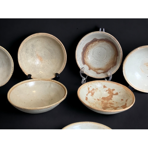 40 - A LARGE COLLECTION OF 10 CHINESE QINGBAI BOWLS. 
SONG DYNASTY & LATER.