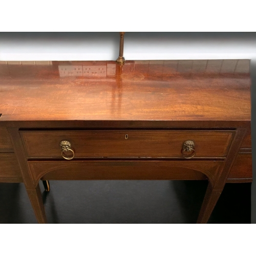 65A - A LATE GEORGIAN / EARLY VICTORIAN MAHOGANY BREAKFRONT SIDEBOARD. WITH BRASS GALLERY.