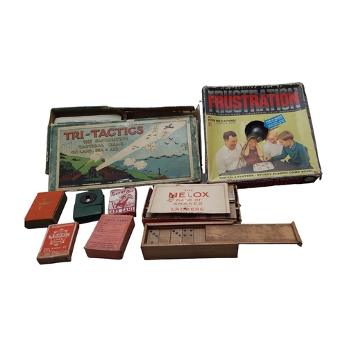 521 - A COLLECTION OF VINTAGE BOARD & TABLE GAMES. INCLUDING DOMINOS, TRI-TACTICS, FRUSTRATION & MORE.