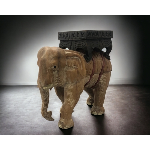 1 - A LARGE INDIAN CARVED WOODEN ELEPHANT GARDEN SEAT.