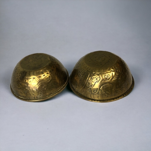 299 - TWO ANTIQUE PERSIAN ENGRAVED BRASS BOWLS.