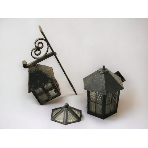 361 - TWO VICTORIAN CAST METAL WALL LANTERNS.