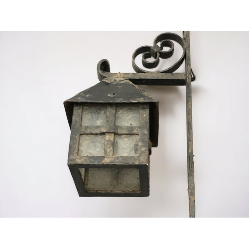 361 - TWO VICTORIAN CAST METAL WALL LANTERNS.