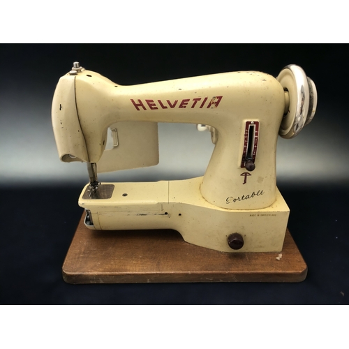 362 - 1950's HELVETIA PORTABLE SEWING MACHINE.