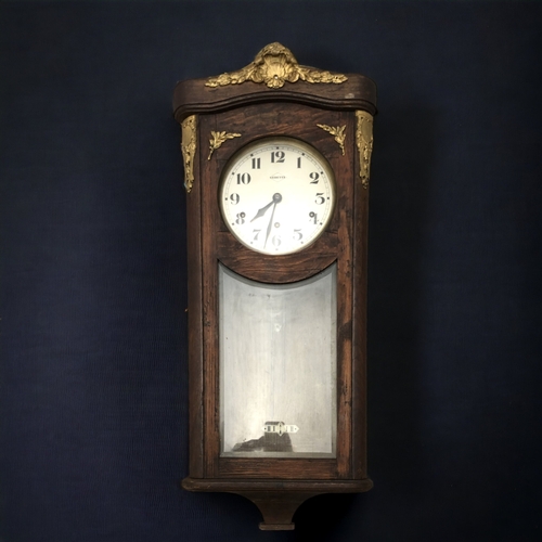 374 - A VICTORIAN 'VEDETTE' CHIMING WALL CLOCK.  WITH CARVED GILT ADORNMENT & EXPOSED PENDULUM.