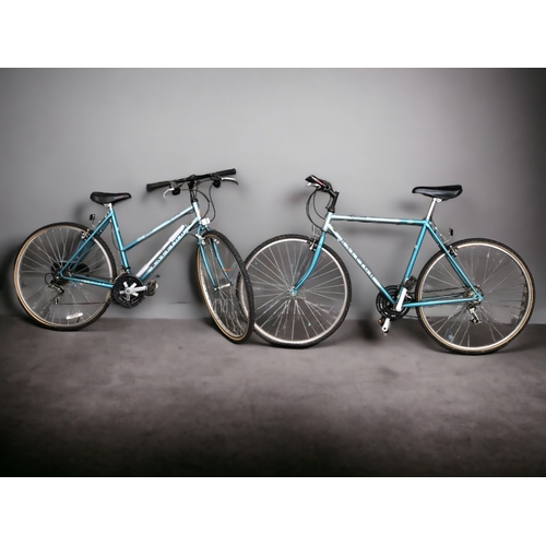 379 - TWO RALEIGH PIONEER SPIRIT TRAIL BICYCLES MENS AND WOMANS PAIR