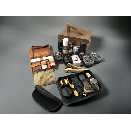 386 - A LARGE LOT OF SHOE POLISHING KITS