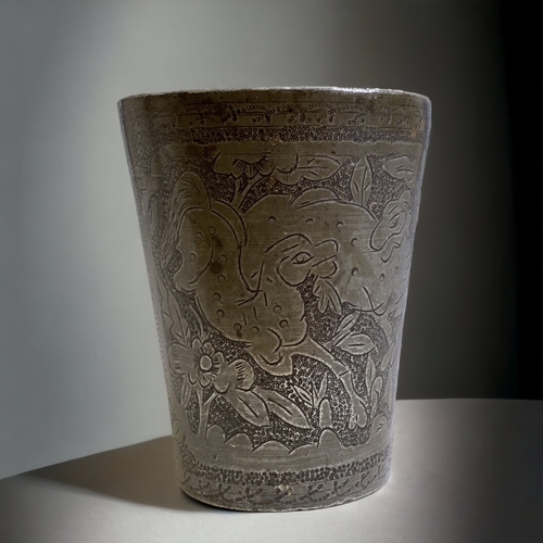 277 - A CHINESE ENGRAVED METAL CUP. DEPICTING LEAPING HORSES? TO FRONT & BIRDS AMONGST BLOSSOMS TO VERSO. ... 