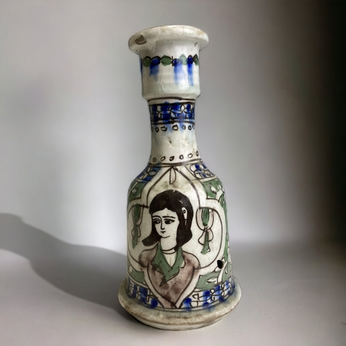 305 - A PERSIAN IZNIK HANDPAINTED 'PORTRAIT' HOOKAH BASE. 
HEIGHT - 21.5CM