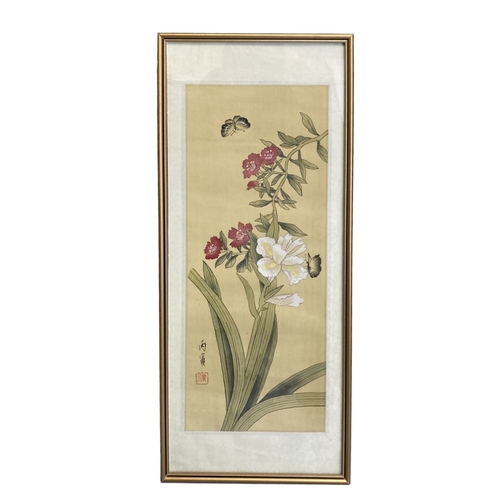 279 - A VINTAGE CHINESE PAINTED SILK PAINTING. DEPICTING BUTTERFLIES AROUND BLOSSOMING FLOWERS. SIGED TO L... 