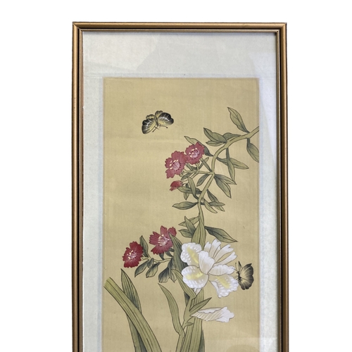 279 - A VINTAGE CHINESE PAINTED SILK PAINTING. DEPICTING BUTTERFLIES AROUND BLOSSOMING FLOWERS. SIGED TO L... 