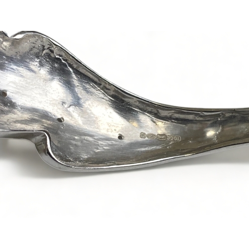 188 - A STERLING SILVER 'LEAF' BANGLE. TGCC BRAND, BRITISH HALLMARKS. IN A PANDORA BOX.