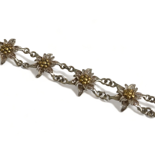 200 - A STERLING SILVER FILIGREE LADIES BRACELET.