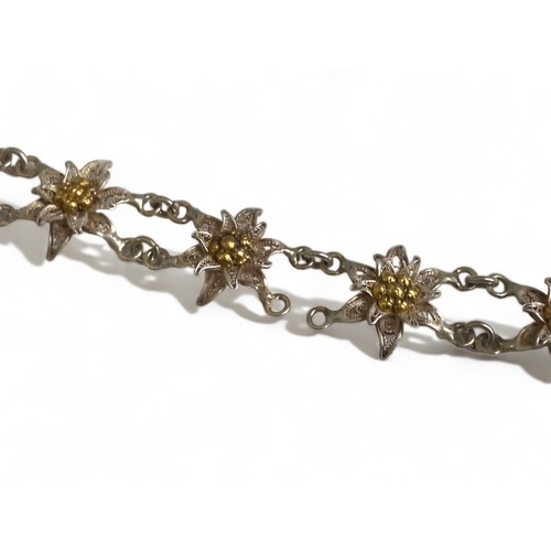 200 - A STERLING SILVER FILIGREE LADIES BRACELET.