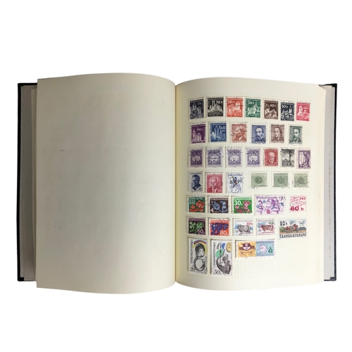 408 - A STAMP ALBUM CONTAINING NUMEROUS INTERNATIONAL STAMPS.