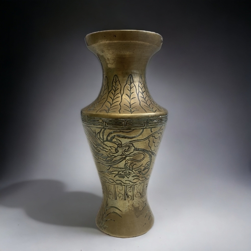 282 - A CHINESE BRONZE 'DRAGON' BALUSTER FORM VASE.
REPUBLIC PERIOD.
 DEPICTING A DRAGON AMONGST CLOUDS, W... 