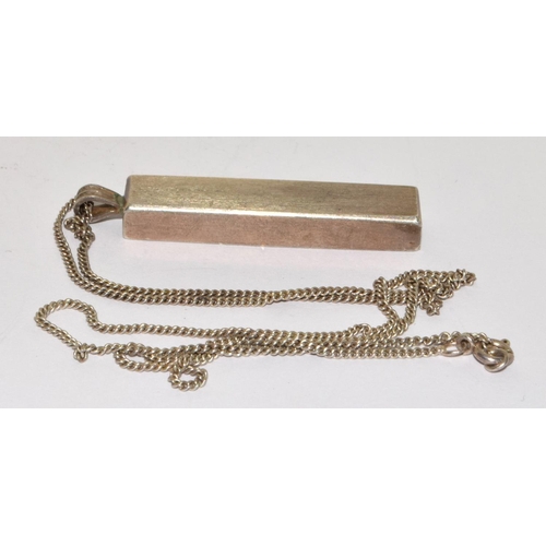 222 - A STERLING SILVER INGOT & CHAIN.
LONDON HALLMARKS.