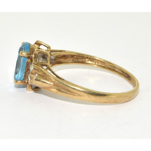 224 - 9ct gold ladies Diamond and Blue topaz ring size R