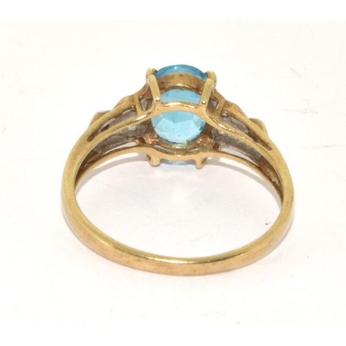 224 - 9ct gold ladies Diamond and Blue topaz ring size R